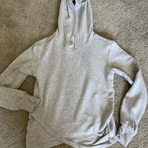 a grey athleta long sleeve top with a hood!